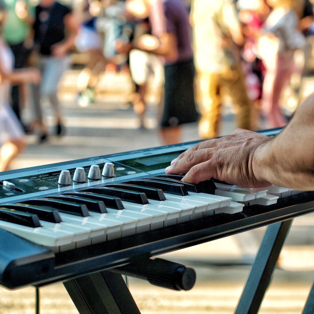 keyboard-player-on-stage-playing-with-band-while-b-2025-03-09-15-43-55-utc
